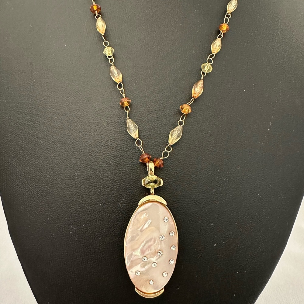 Monet gold tone bead necklace with mother of pearl pendant